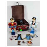 Dress up toys, magnetic clothes on wooden bodies,