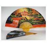 Two large painted fabric fans, 59" wide, seller