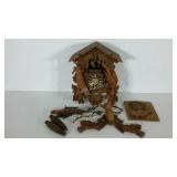 Cuckoo clock, in need of repair, lots of pieces