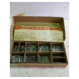 Cotter pins, cardboard organizer box with a bunch