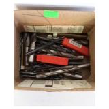 Small box with several drill bits all sizes