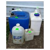 Group of shop liquids kerosene cans some oil some
