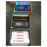 Three plastic milk crates with various shop