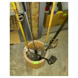 Four fishing poles with reels