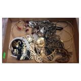 Flat of costume jewelry