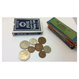 Few foreign coins, deck of cards, and money