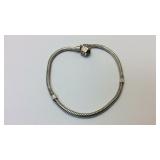 Sterling Silver 8 inch Charm Bracelet tests to be