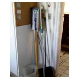 Group of cleaning items, dust pan, mop, duster,
