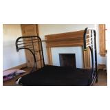 Black metal futon/bed with cushion seating and
