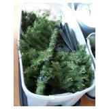 Large tote with artificial Christmas tree,