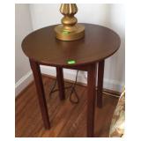 Round side table measures 24" x 28"