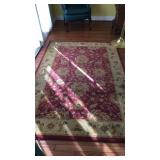 Red and tan foyer rug, measures 89 x 58"