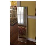 Mirror measures 12 x 48"