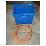 Blue plastic box/tote and orange extension cord
