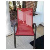Red mesh and metal framed patio chair