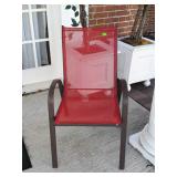 Red mesh and metal framed patio chair