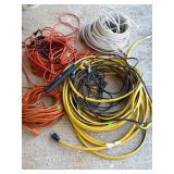 Group lit of extension cords and electrical wire