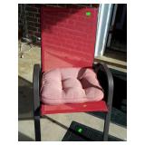 Red mesh, black metal framed patio chair with