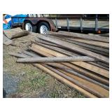 Pile of 2x4x8ft long boards