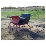 Horse drawn sleigh curved dash seat has tear