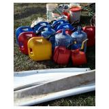 Group lot, 11 various plastic gas cans, and