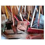 Assorted long handle tools, brooms, pitch fork,
