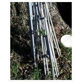 Four tripod lawn sprinklers