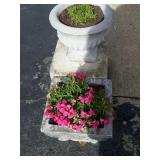 4 concrete planters. some chips.