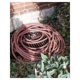 Large rubber garden house and galvanized trash