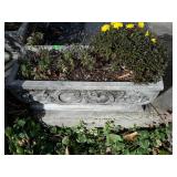 Concrete planter. 28" x 13" x 9". Front of main