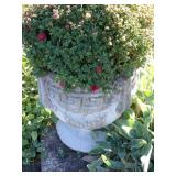 Concrete planter 16 inches tall, on backside of