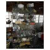 Two wire racks with contents, seven bins high,