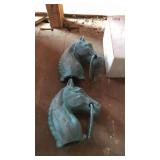 Two cast iron horse head hitching posts no box
