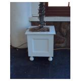 Ball footed planter boxes with artificial tree