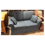 Sleeper love seat blue shows some use wear but