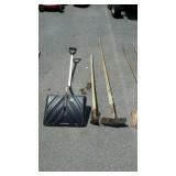 Long handled tool lot includes snow shovel and