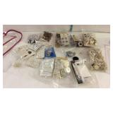 Assorted buttons - some metal, two plastic pouches