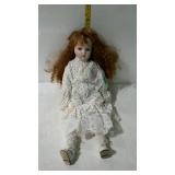 15" porcelain doll in black & white polka dot