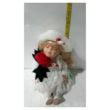 8" tall seated music box doll in white dress -