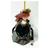 16" porcelain doll in green "royalty" dress with