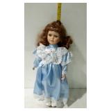 16" porcelain doll in light blue dress