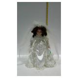 16" porcelain bride doll with doll stand, one