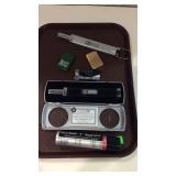 Zippo lighters and bottle ofbutnae gas