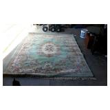 Wool oriental area rug with center medallion,
