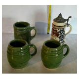 Mugs - three pottery mugs, one German beer stein