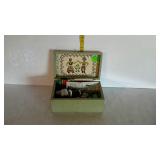 Sewing supplies in wooden dresser box