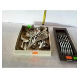 Silver plated flatware and stainless knife set in