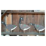 Yard ornaments - three wooden cut-out geese,