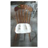 Oak side chair with carved back and chair cushion