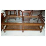 Coffee table with glass top and under shelf -